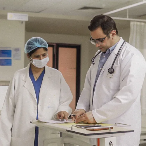 Doctors reviewing patient chart